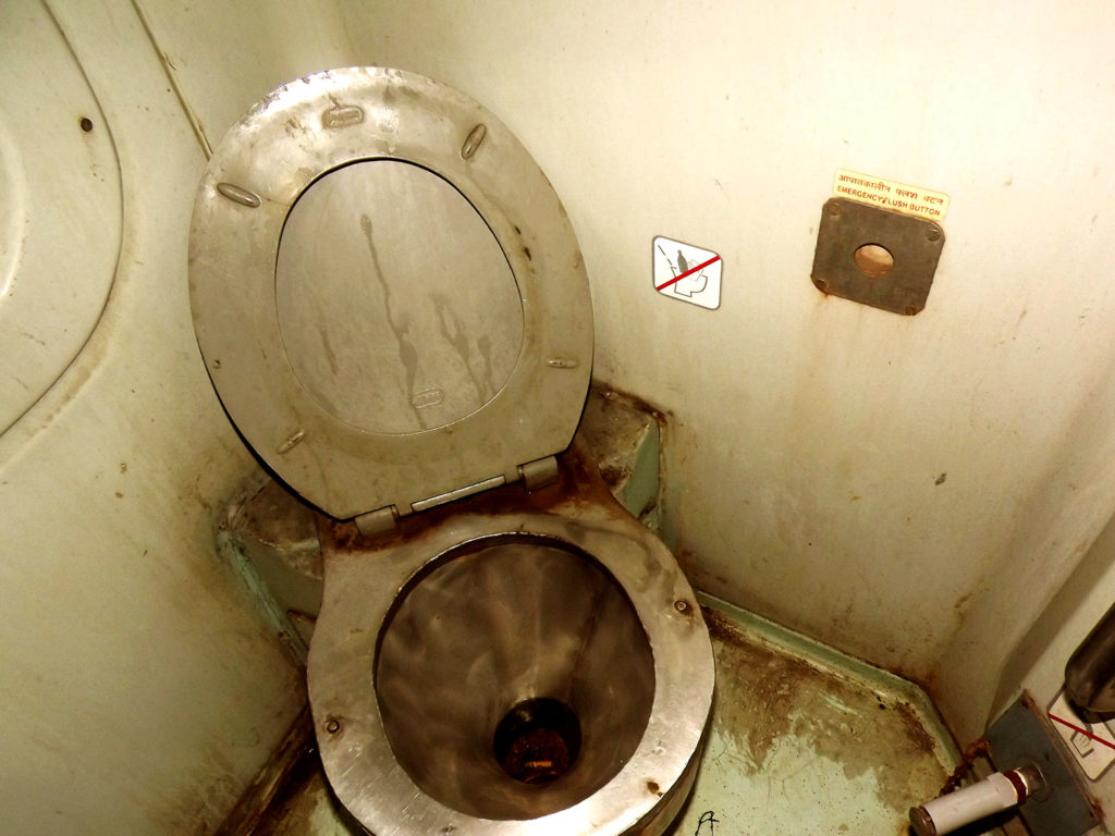 A Farbound.Net Photo showing a western style commode onboard a Ranchi-Rajdhani Ac 3 tire coach.