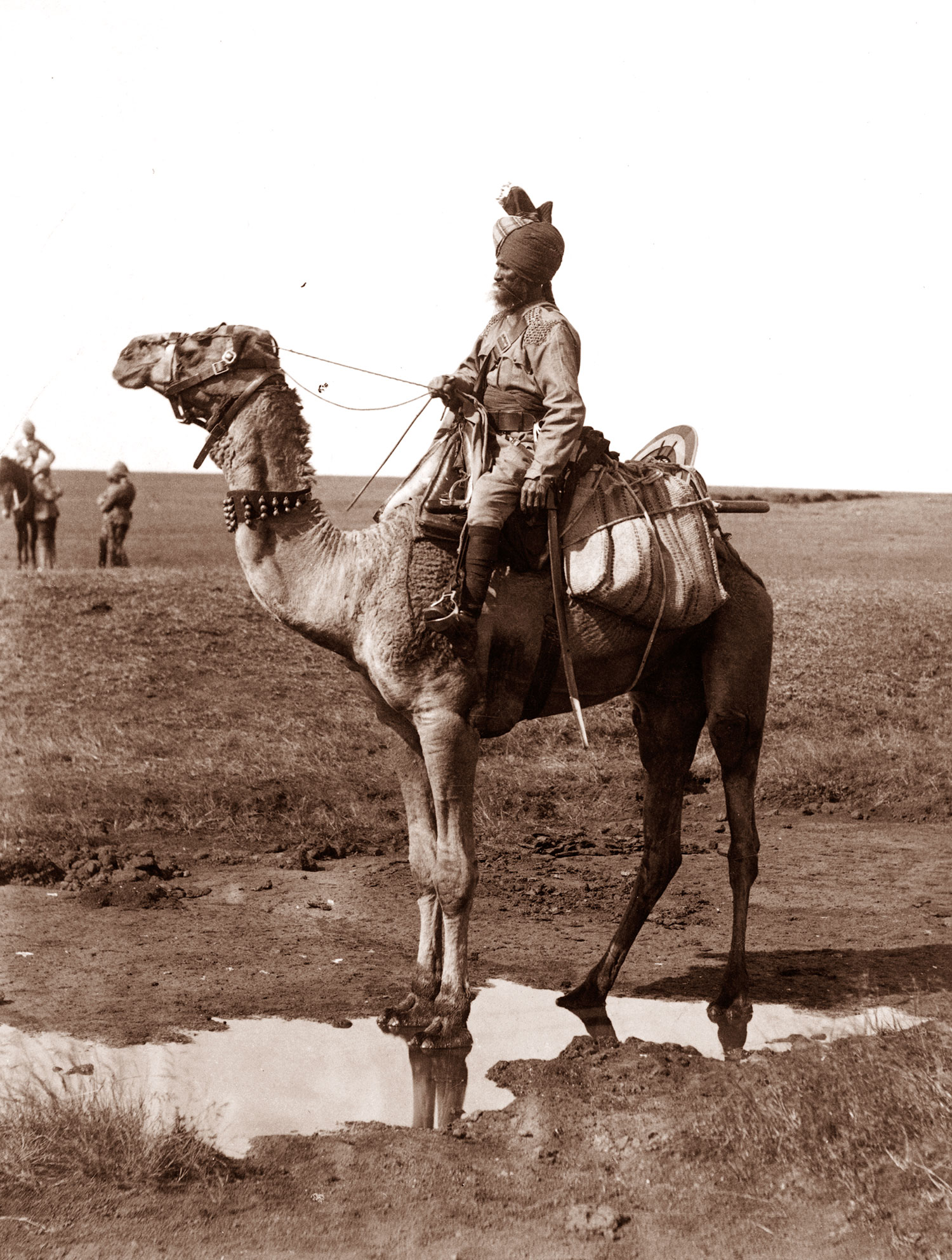 Image shows a yesteryear photograph of a mounted trooper astride a single humped dromedary in an unspecified location in British India, 1st, January, 1857.