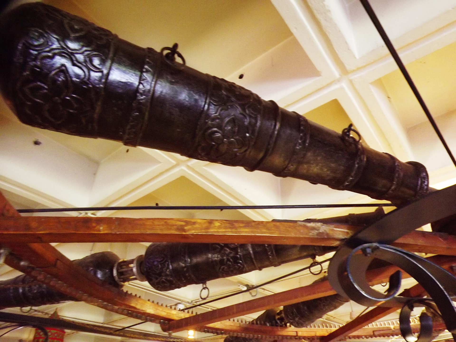 Image is a Farbound.Net photo: Showing Gurkani era cannons upheld with shafts attached to a reconstructed model of the Yarghu.